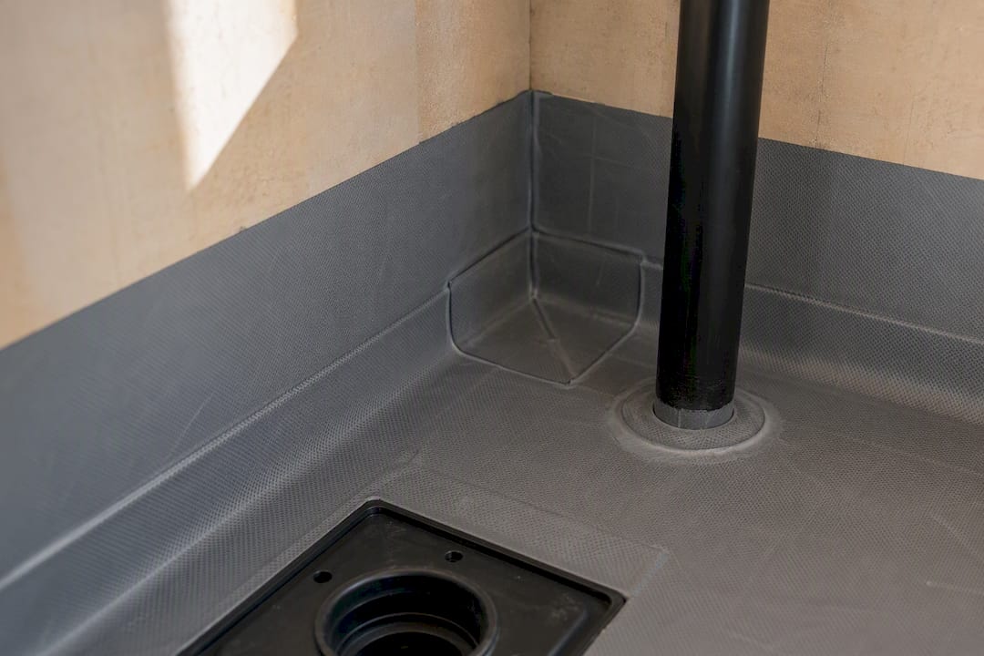 Waterproofing membrane at shower corner penetration