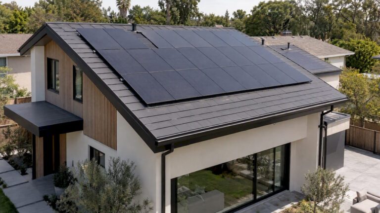 Modern home roof fitted with solar panels